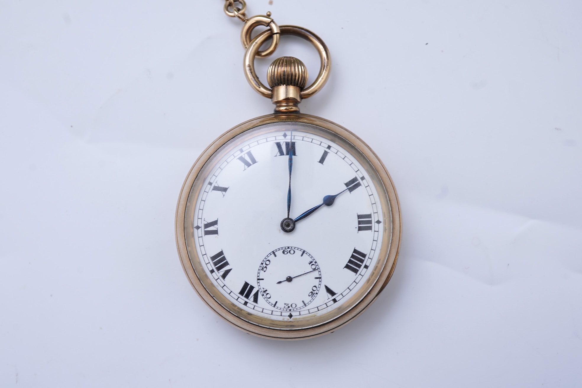An amethyst fob seal, a gold Albert chain, and a pocket watch